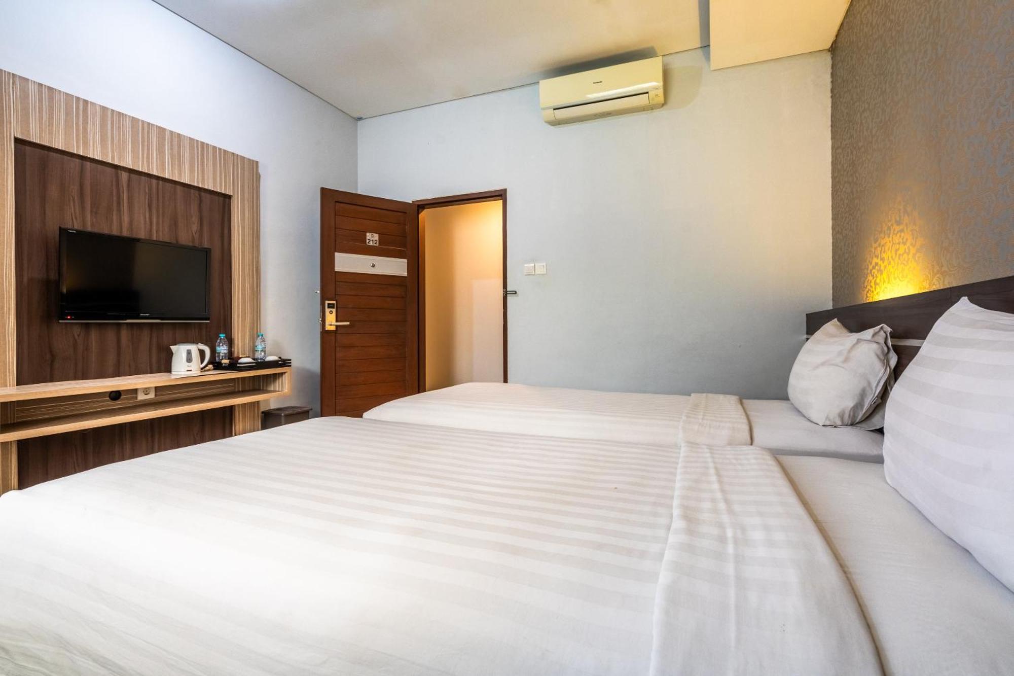 Chambre Deluxe Double ou Lits Jumeaux